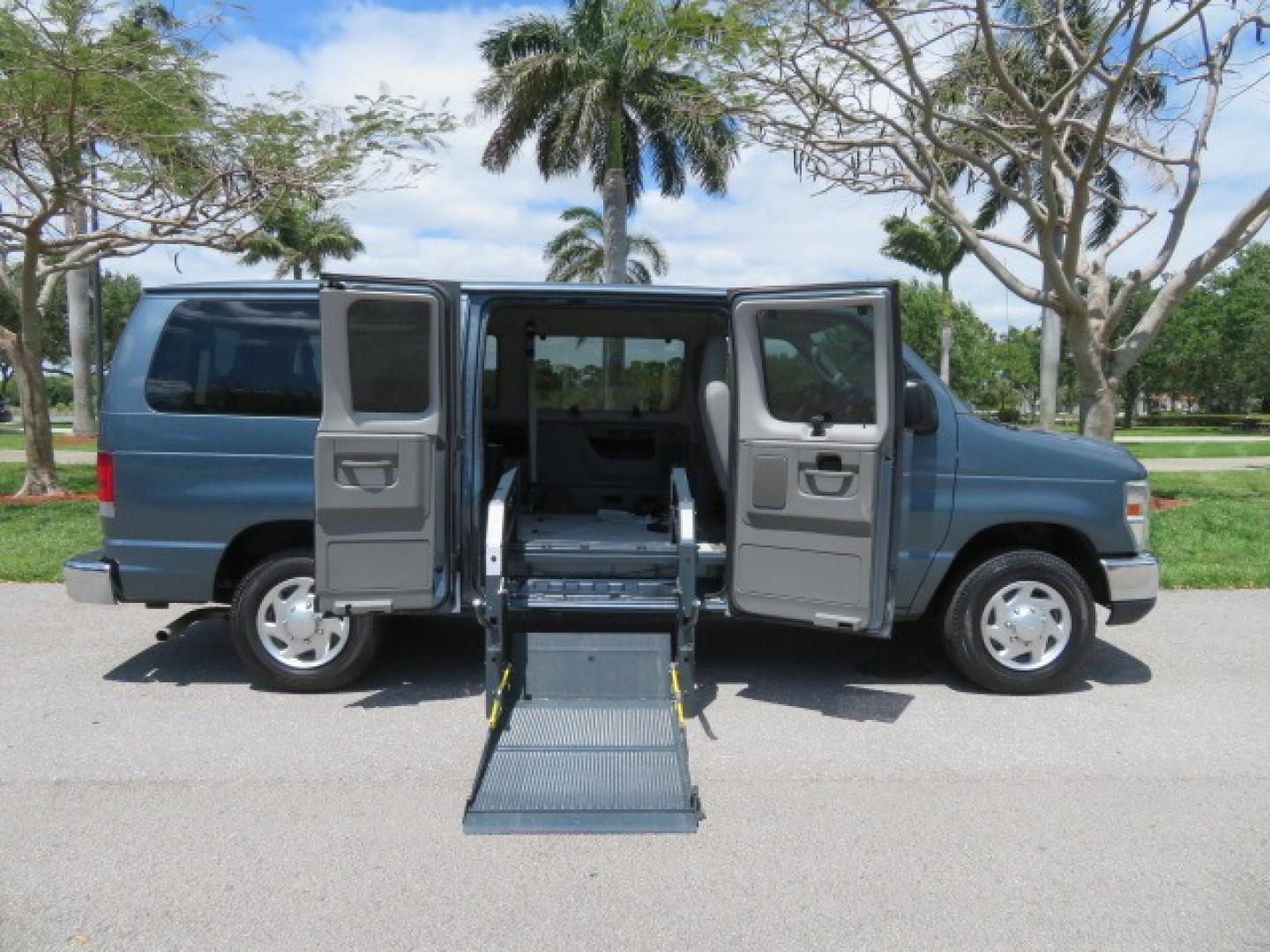 2013 Dark Blue /Gray Ford E-Series Wagon XLT (1FMNE1BW4DD) with an 4.6L V8 engine, Automatic transmission, located at 4301 Oak Circle #19, Boca Raton, FL, 33431, (954) 561-2499, 26.388861, -80.084038 - You are looking at a Gorgeous 2013 Ford E150 XLT Handicap Wheelchair Conversion Van with 22K Original Miles, Tie Down System, Power Electric VMI Side Entry Wheelchair Lift, Back Up Camera, Factory Navigation and Much Much More. This van is Awesome. This is a Nice Rust Free Van with a Clean Carfax, C - Photo#39